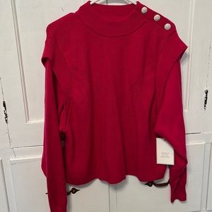 Fuchsia sweater with jewel details on shoulder
